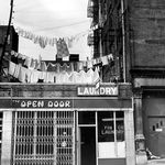"1977: Clean washing hanging out to dry above a laundry one block west of the more glamorous Times Square."